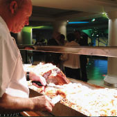 Chef carving hog roast